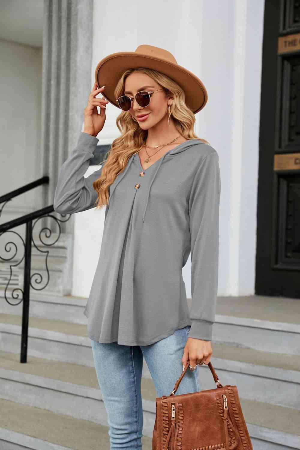 Blusa con capucha de manga larga