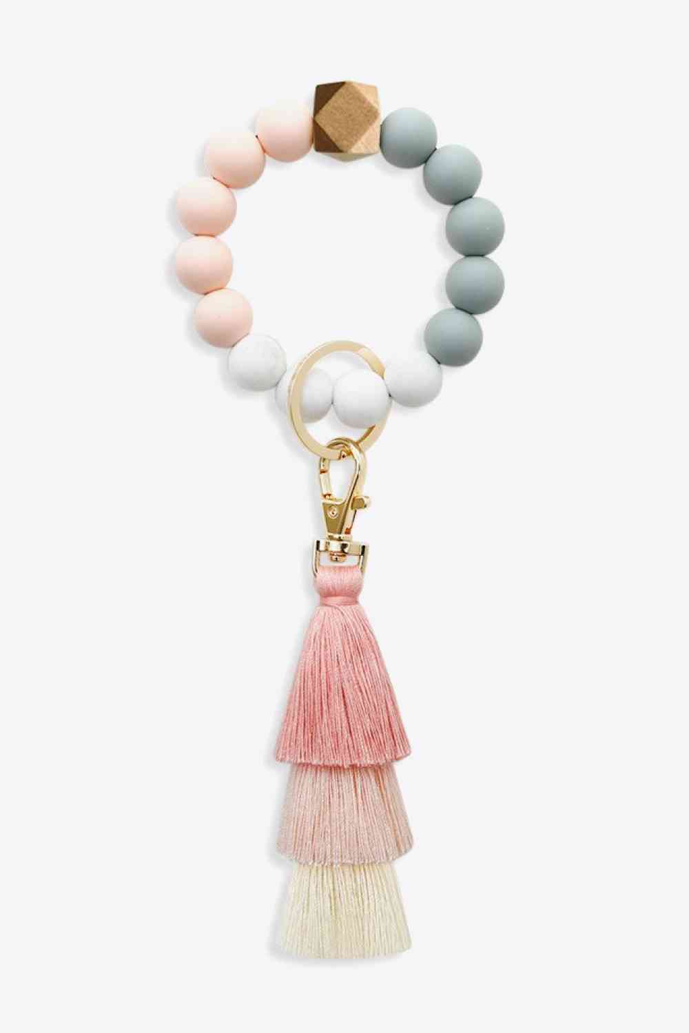 Paquet de 3 porte-clés avec bracelet en perles et pompon