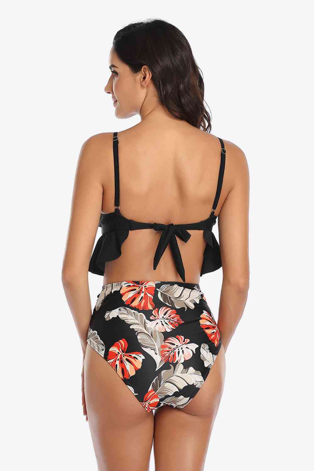 Traje de baño de dos piezas con volantes y estampado tropical