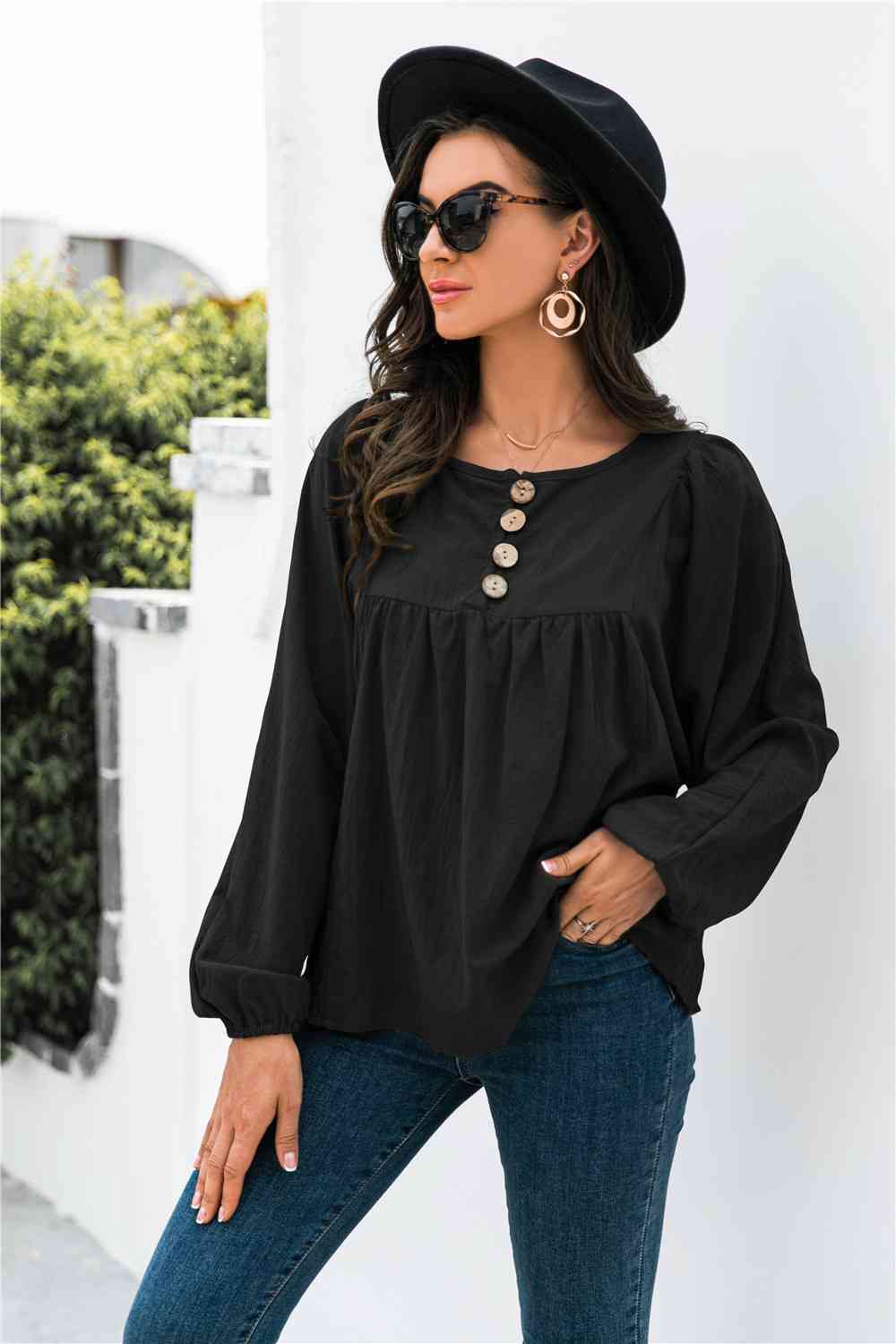 Blusa con botones y manga globo