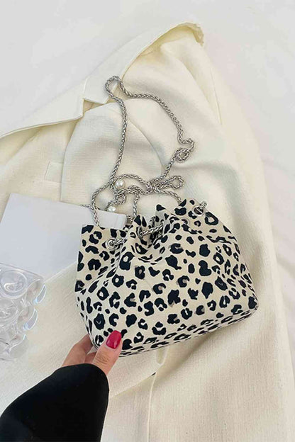 Bolso bombonera de nailon con estampado animal