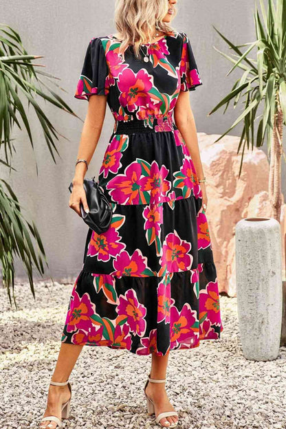 Vestido midi escalonado con mangas abullonadas y estampado floral