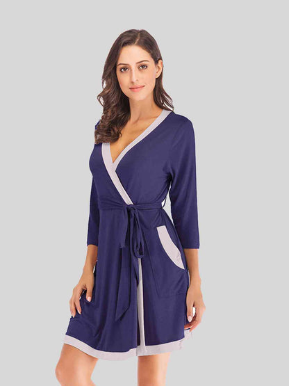 Robe à col surplis et poches à nouer à la taille