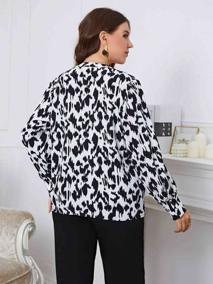 Melo Apparel Blouse imprimée à manches longues et col en V grande taille