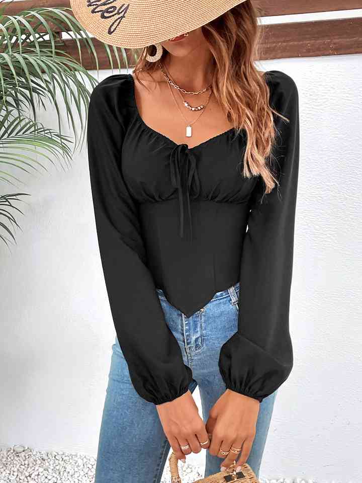 Blusa con cuello cuadrado y manga raglán