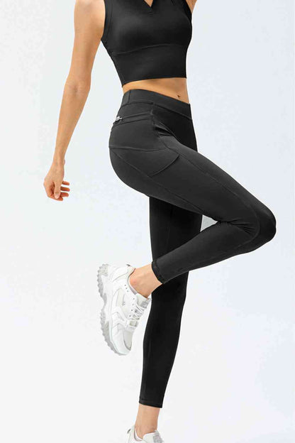 Pantalon de sport long taille haute coupe slim avec poches