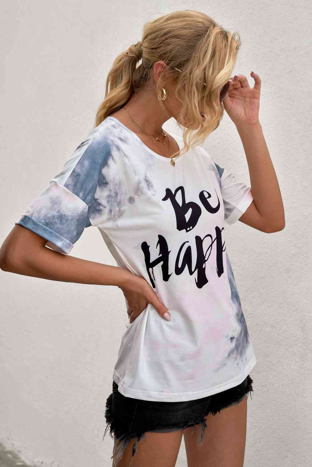 Camiseta estampada con cuello redondo BE HAPPY