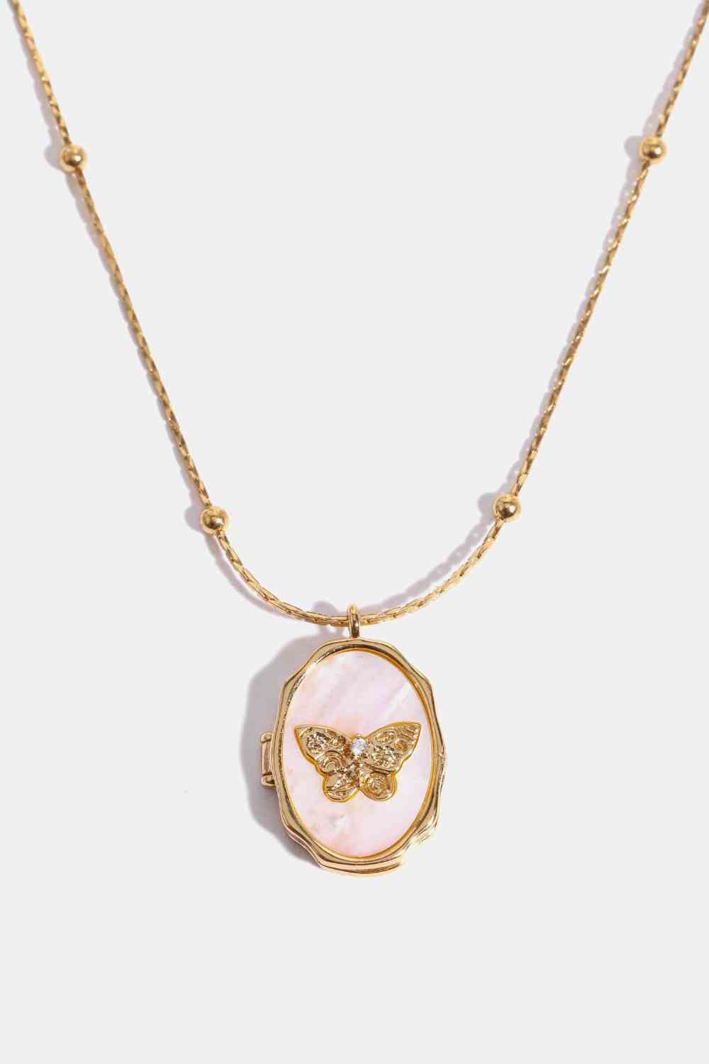 Collier en cuivre pendentif coquille de papillon