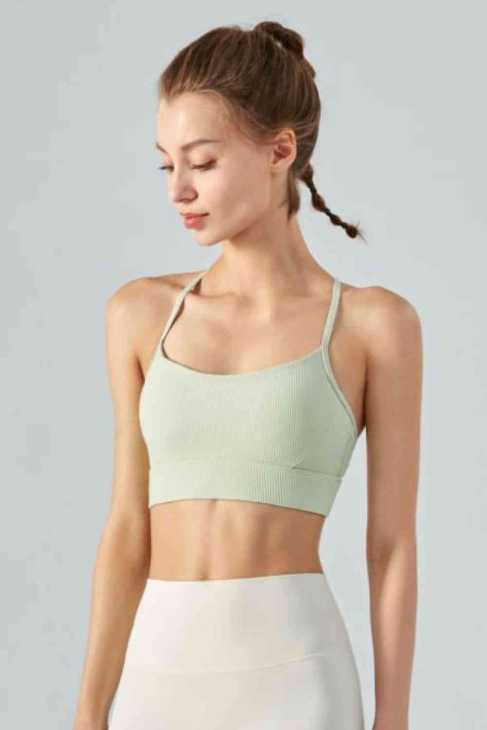 Camisole de sport courte côtelée à col licou et dos ouvert