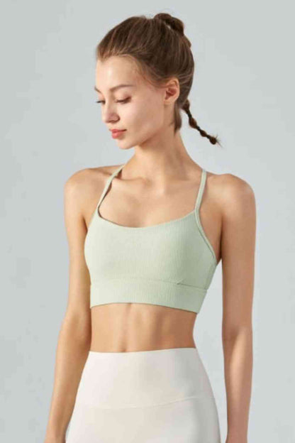 Cami deportivo corto con cuello halter y espalda abierta de canalé