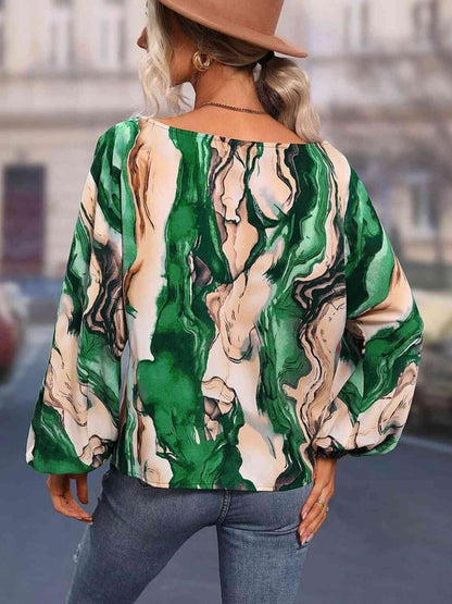 Blusa estampada con cuello barco