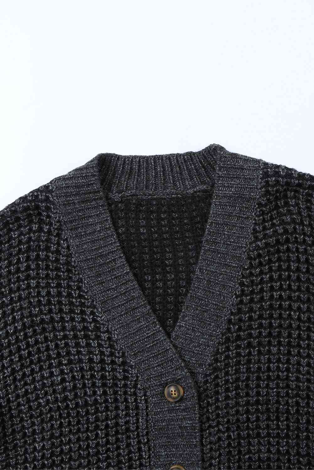 Cardigan boutonné à épaules tombantes en tricot gaufré tissé à droite