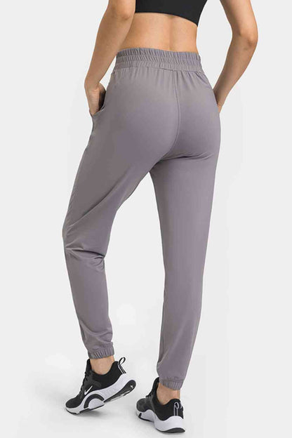 Pantalon de yoga à taille élastique avec poches