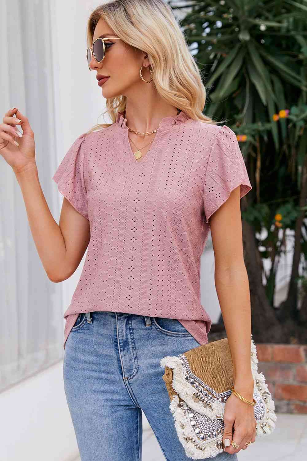 Blouse à manches bouffantes et col cranté