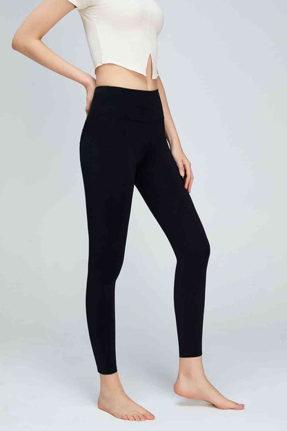 Leggings de sport à large ceinture et détails de couture