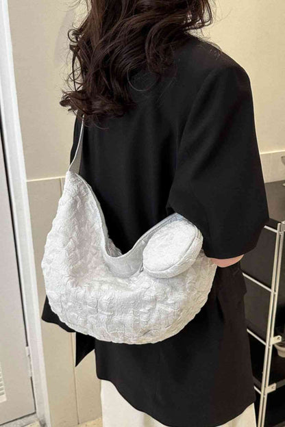 Sac à bandoulière en polyester texturé