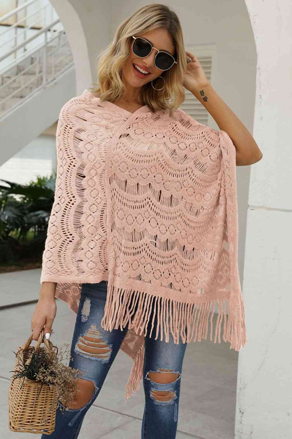 Poncho en tricot à franges et col en V