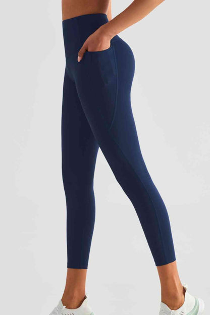 Leggings deportivos de cintura ancha con bolsillos