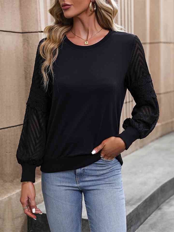 Blusa de manga larga con cuello redondo