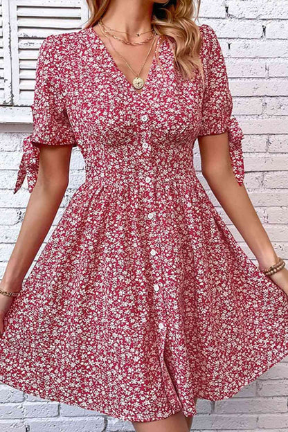 Vestido con botones delanteros y mangas abullonadas con estampado floral de florecitas