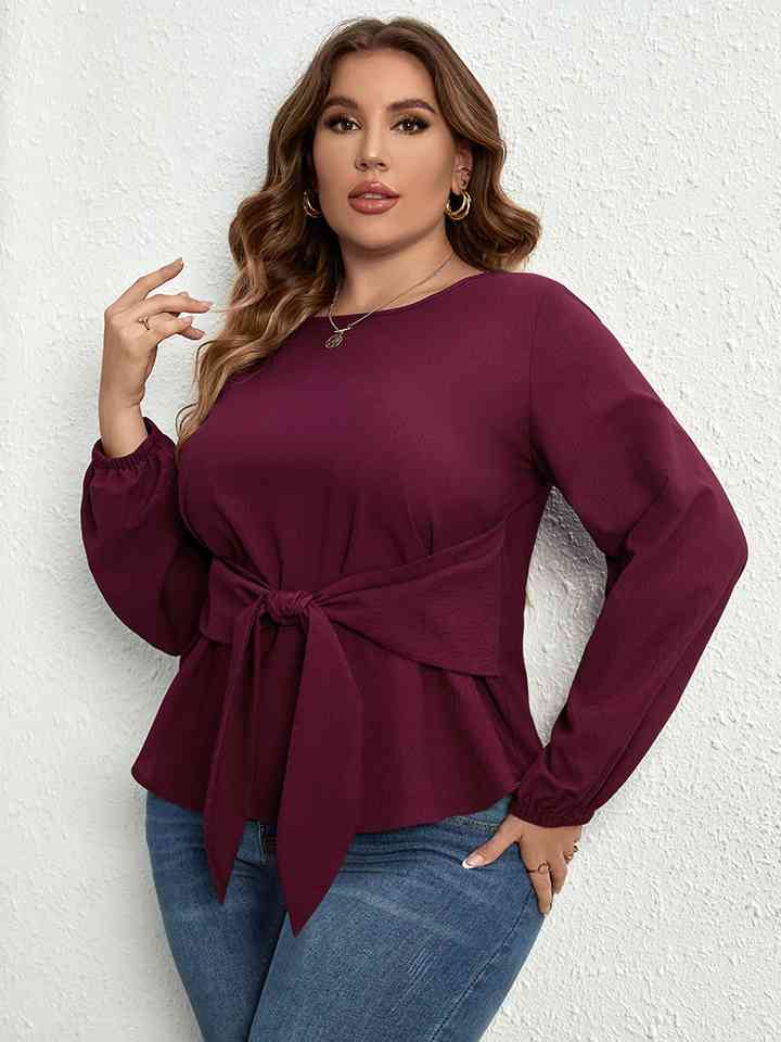 Blusa de manga larga con cuello redondo y cintura anudada de talla grande