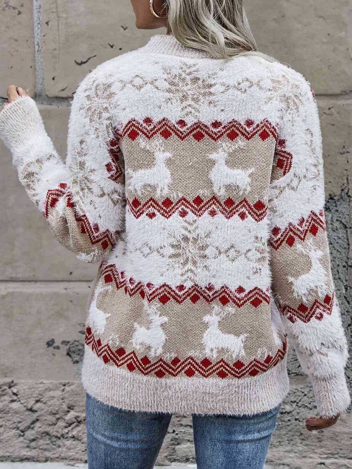 Suéter con cuello redondo de reno y copo de nieve