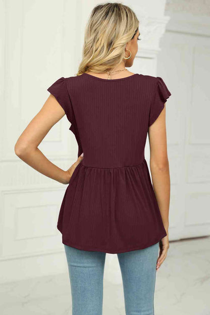 Blusa babydoll con mangas acampanadas y cuello en V