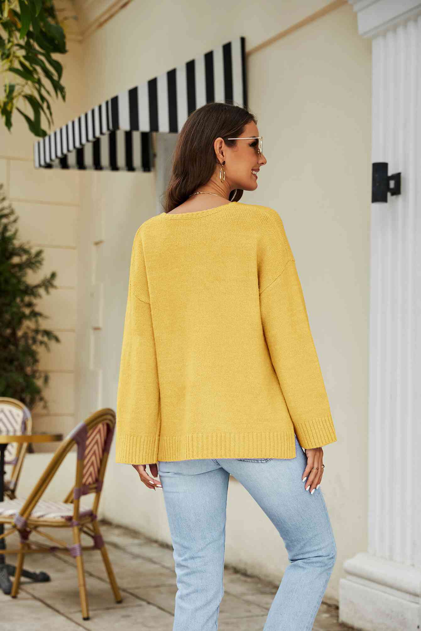 Pull en tricot à col en V et épaules tombantes