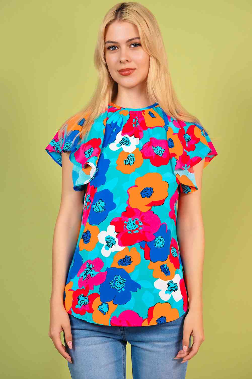 Blusa floral con cuello redondo y lazo