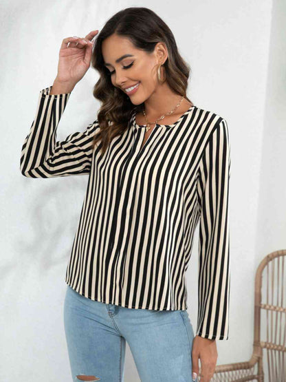 Blouse crantée à manches longues rayée