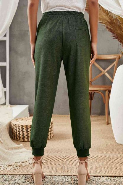 Pantalon de jogging avec poche à taille élastique et cordon de serrage