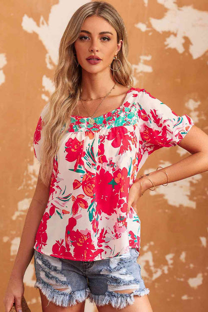 Blusa floral con cuello cuadrado y lazo en la espalda