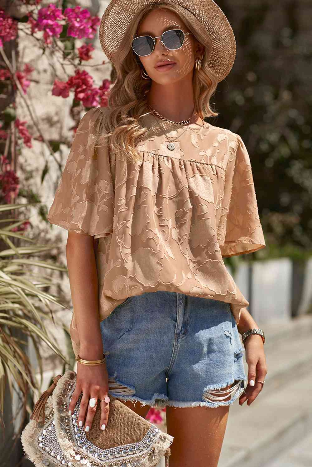 Blusa con cuello redondo y manga abullonada