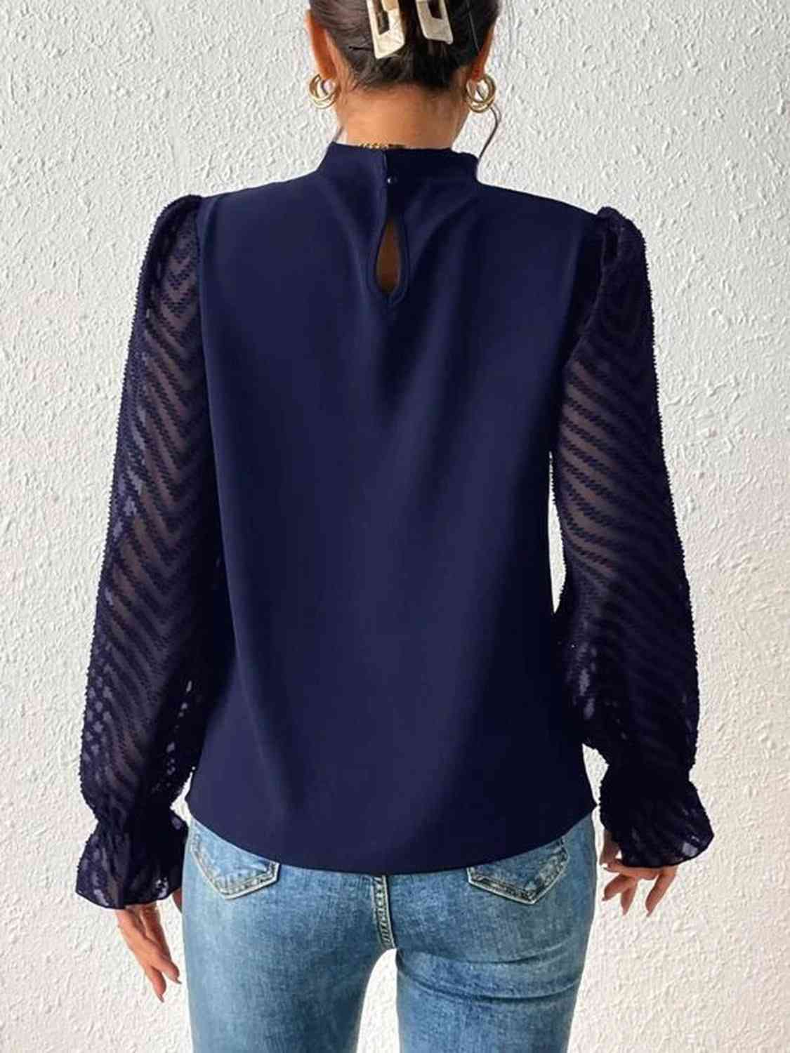 Blusa de manga con volante y cuello simulado