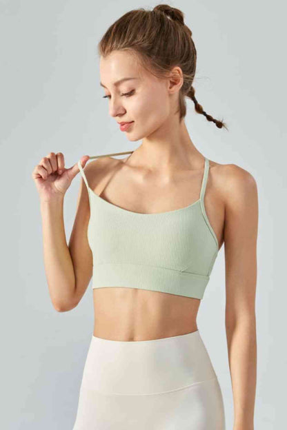 Cami deportivo corto con cuello halter y espalda abierta de canalé