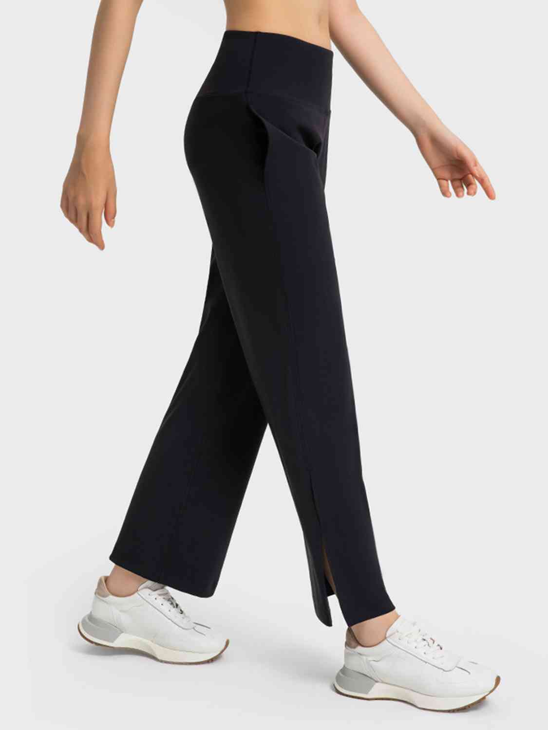 Pantalon de sport fendu à jambe large avec poches