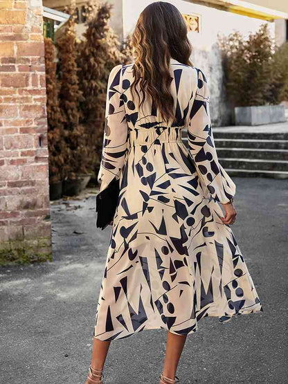 Robe midi imprimée à col en V et manches longues