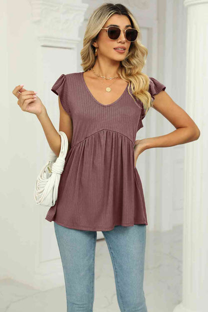 Blusa babydoll con mangas acampanadas y cuello en V