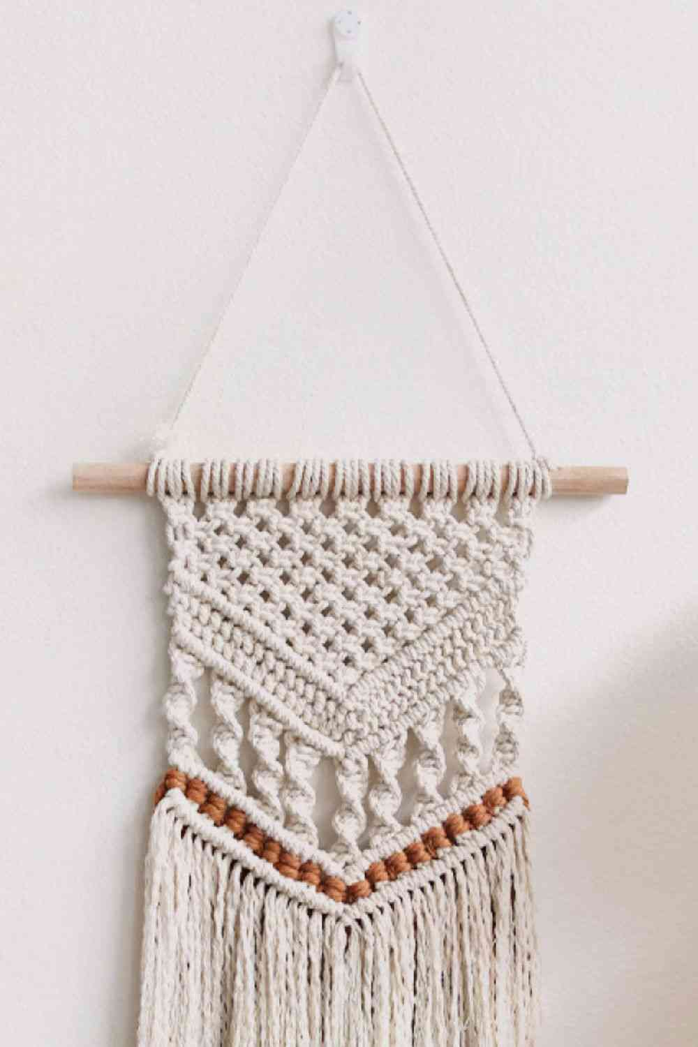 Colgante de pared con flecos de macramé