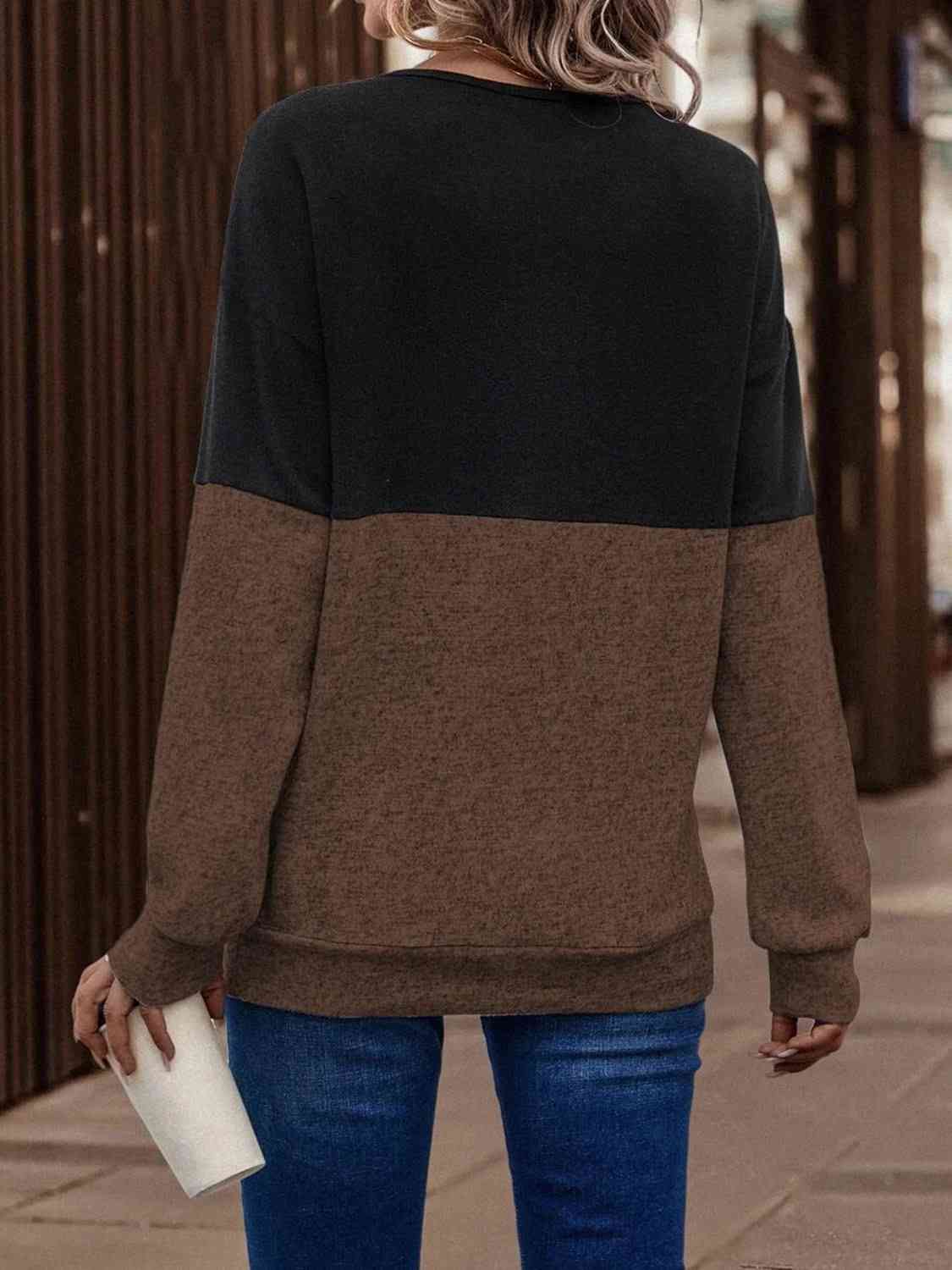 Sudadera bicolor con detalle cruzado