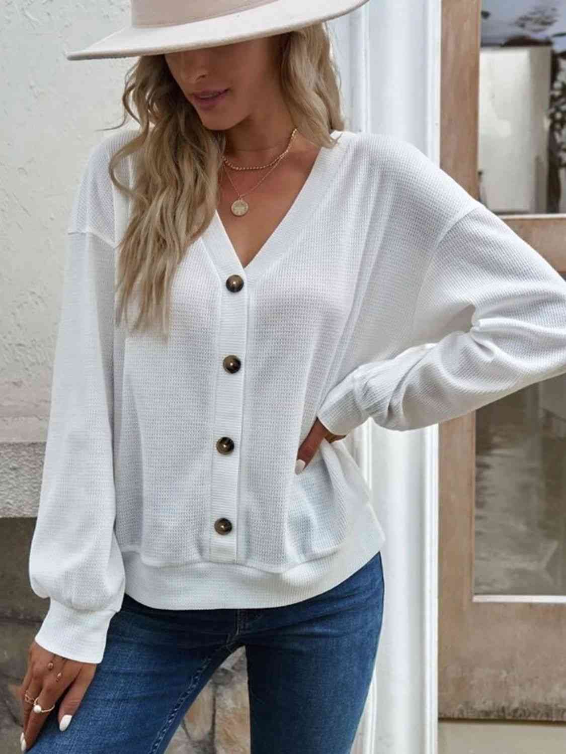 Blouse à épaules tombantes et col en V