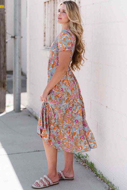 Vestido midi con cuello redondo y manga con volante floral