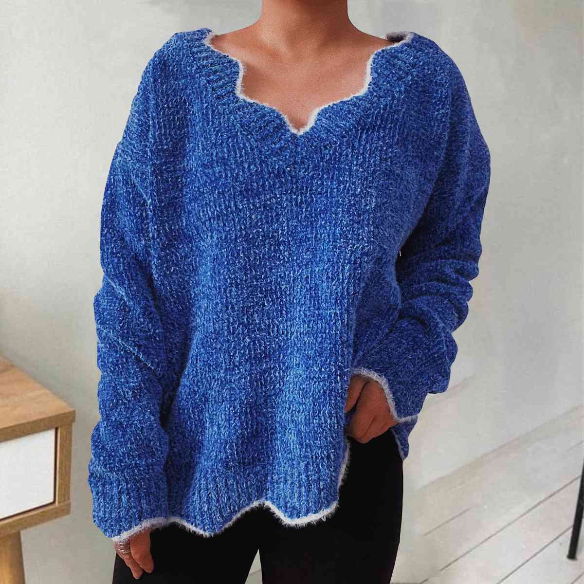 Pull à manches longues et col en V avec épaules tombantes