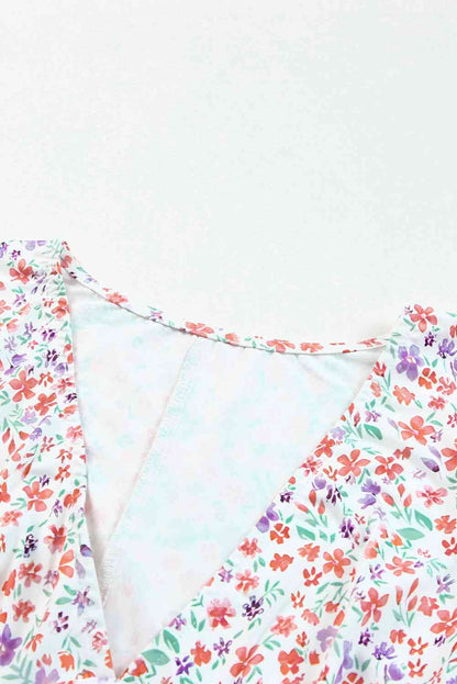 Body escotado de manga larga con estampado floral de florecitas