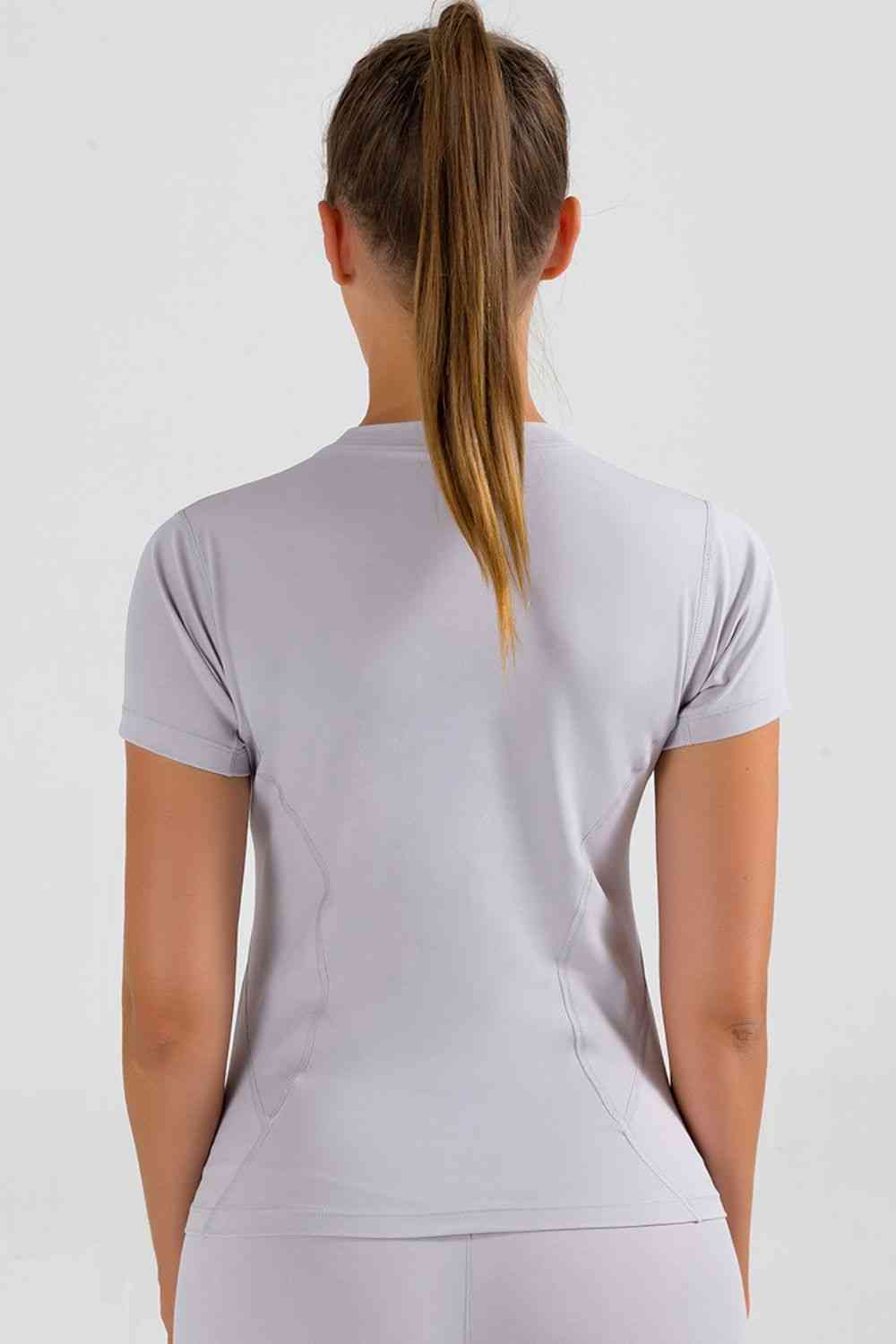 Camiseta deportiva de manga corta con cuello redondo