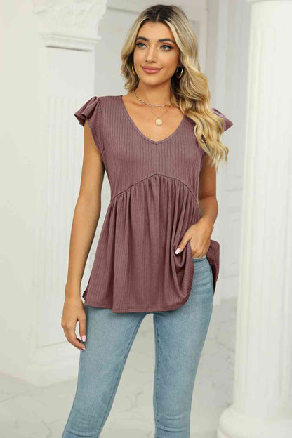 Blusa babydoll con mangas acampanadas y cuello en V