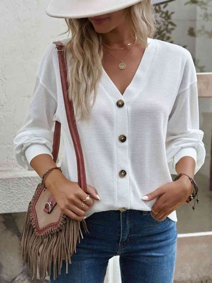 Blouse à épaules tombantes et col en V