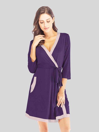 Robe à col surplis et poches à nouer à la taille