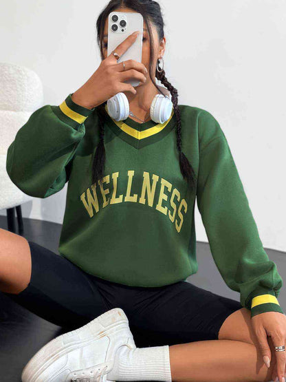 WELLNESS Sweat-shirt graphique à col en V