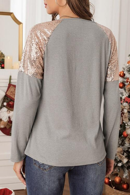 FELIZ NAVIDAD Blusa con cuello redondo y lentejuelas